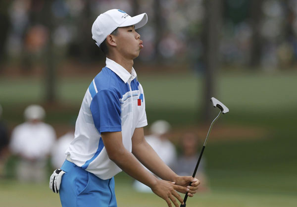 Guan fires 73 in historic Masters debut