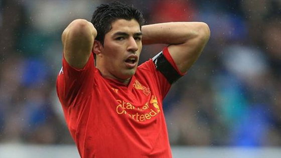 Contrite Suarez accepts FA ban